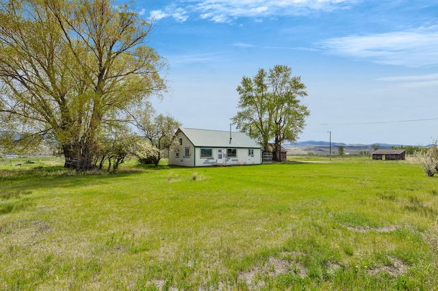 1680 W River Rd, Deer Lodge, MT 59722 - view of grassy yard with a view of countryside