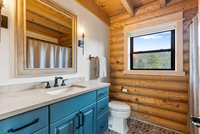 1266 Ousel Falls Rd, Big Sky, MT 59716 - full bathroom featuring rustic walls, vanity, toilet, and wood ceiling with exposed beams
