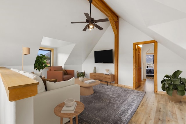 1266 Ousel Falls Rd, Big Sky, MT 59716 - living room featuring wood finished floors, healthy amount of natural light, and a ceiling fan