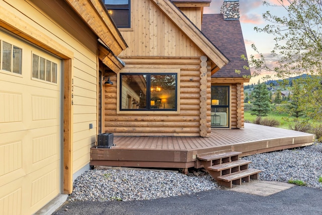 1266 Ousel Falls Rd, Big Sky, MT 59716 - view of deck at dusk