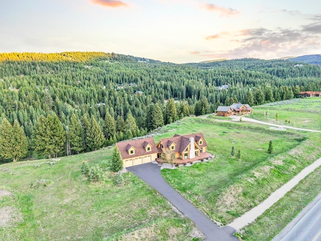 1266 Ousel Falls Rd, Big Sky, MT 59716 - aerial view of property and surrounding area with a forest