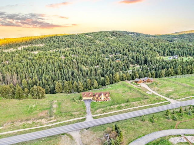 1266 Ousel Falls Rd, Big Sky, MT 59716 - aerial overview of property's location with a forest