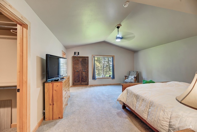 115 Grassy Mountain Rd, White Sulphur Springs, MT 59645 - bedroom with light carpet, lofted ceiling, baseboards, and ceiling fan