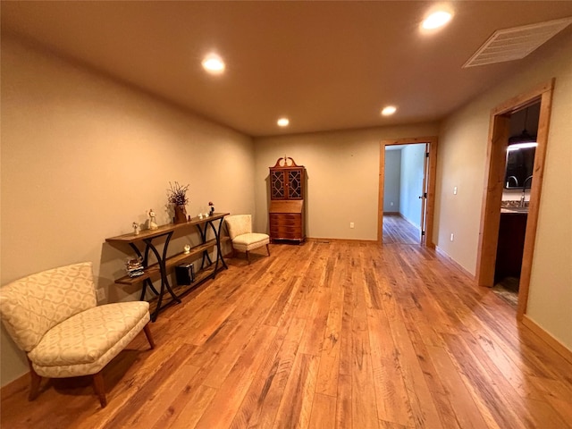115 Grassy Mountain Rd, White Sulphur Springs, MT 59645 - sitting room featuring recessed lighting, wood finished floors, and baseboards