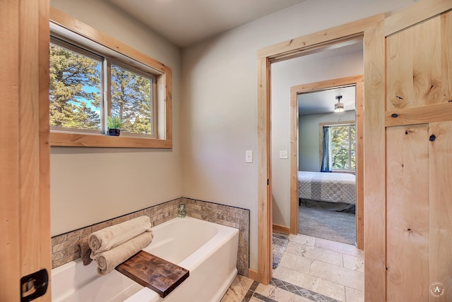 115 Grassy Mountain Rd, White Sulphur Springs, MT 59645 - ensuite bathroom with a bath and baseboards