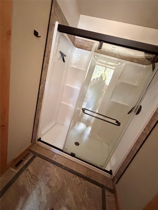 115 Grassy Mountain Rd, White Sulphur Springs, MT 59645 - full bath featuring a stall shower and baseboards