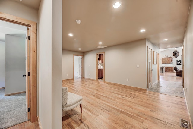 115 Grassy Mountain Rd, White Sulphur Springs, MT 59645 - corridor with recessed lighting, light wood-type flooring, and baseboards