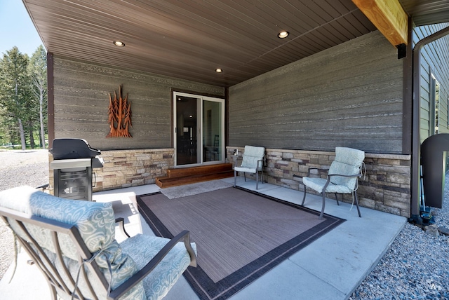 115 Grassy Mountain Rd, White Sulphur Springs, MT 59645 - view of patio with a grill and entry steps