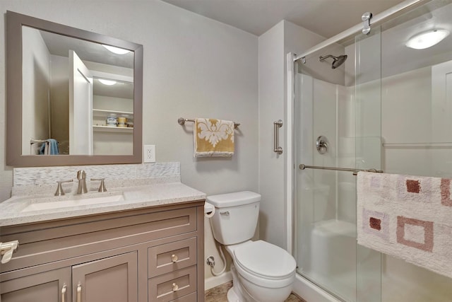 510 Mission St, Stevensville, MT 59870 - bathroom with a stall shower, vanity, and toilet