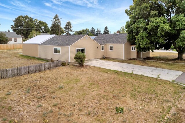 510 Mission St, Stevensville, MT 59870 - rear view of house featuring concrete driveway