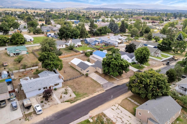 510 Mission St, Stevensville, MT 59870 - aerial view of residential area with a mountainous background