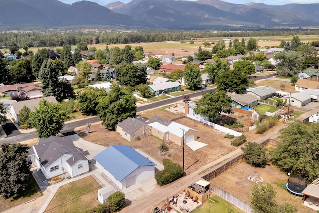 510 Mission St, Stevensville, MT 59870 - aerial perspective of suburban area featuring a mountain backdrop