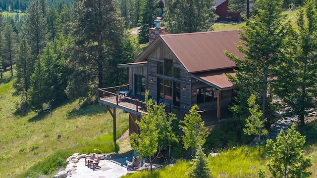 208 Hyden Ridge Rd, Lakeside, MT 59922 - view of subject property featuring a forest
