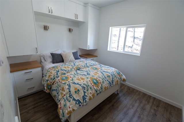 412 Bear Canyon Rd, Lakeside, MT 59922 - bedroom featuring dark wood finished floors and baseboards