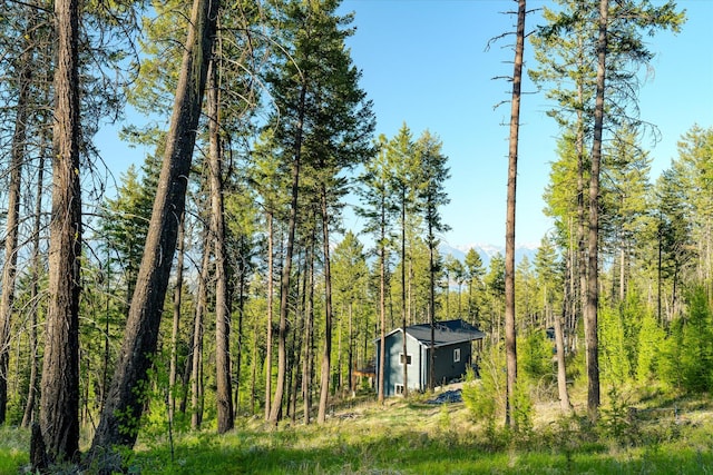 412 Bear Canyon Rd, Lakeside, MT 59922 - view of yard featuring a wooded view