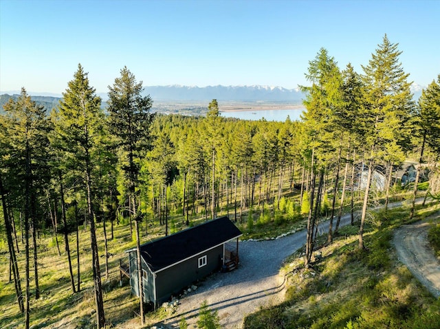 412 Bear Canyon Rd, Lakeside, MT 59922 - exterior space with a mountainous background and a heavily wooded area
