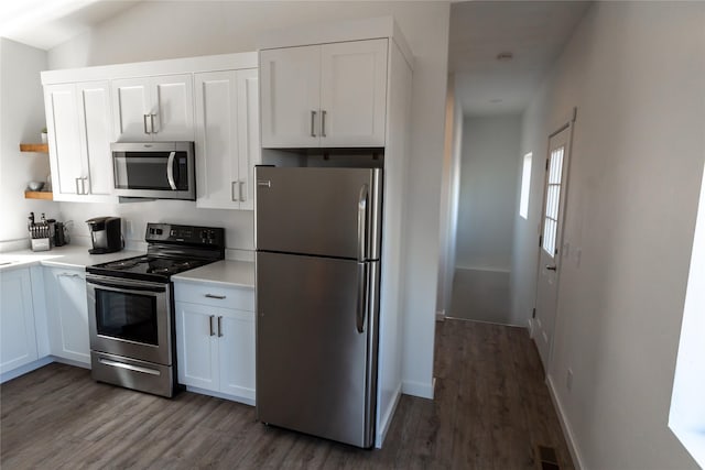 412 Bear Canyon Rd, Lakeside, MT 59922 - kitchen featuring stainless steel appliances, light countertops, white cabinets, wood finished floors, and open shelves