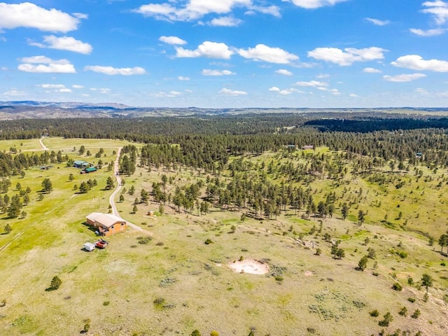16 Grassland Way, Roundup, MT 59072 - overview of rural landscape with a heavily wooded area and mountains