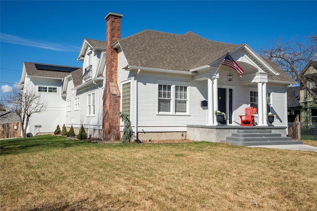 442 4th Ave E, Kalispell, MT 59901 - view of exterior entry with covered porch and roof with shingles