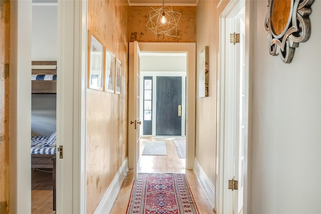 442 4th Ave E, Kalispell, MT 59901 - bedroom with baseboards, light wood-style flooring, multiple windows, ornamental molding, and a ceiling fan