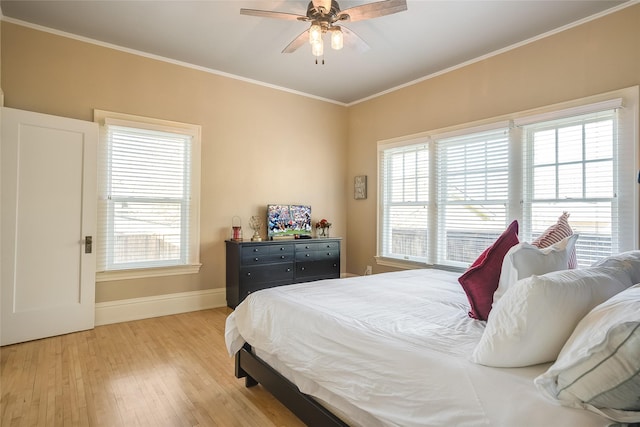 442 4th Ave E, Kalispell, MT 59901 - bedroom with radiator, light wood-style flooring, ornamental molding, baseboards, and ceiling fan