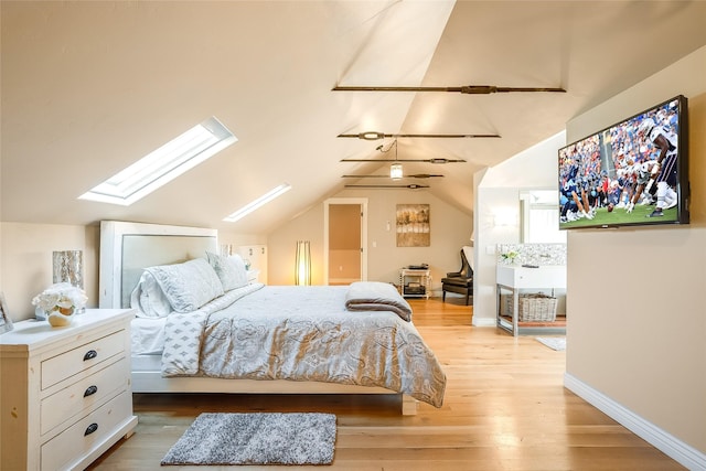 442 4th Ave E, Kalispell, MT 59901 - bedroom featuring lofted ceiling and wood finished floors