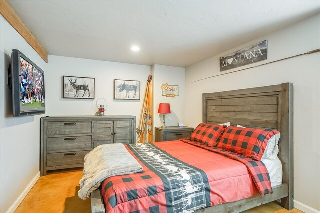 442 4th Ave E, Kalispell, MT 59901 - living room featuring baseboards and wood finished floors