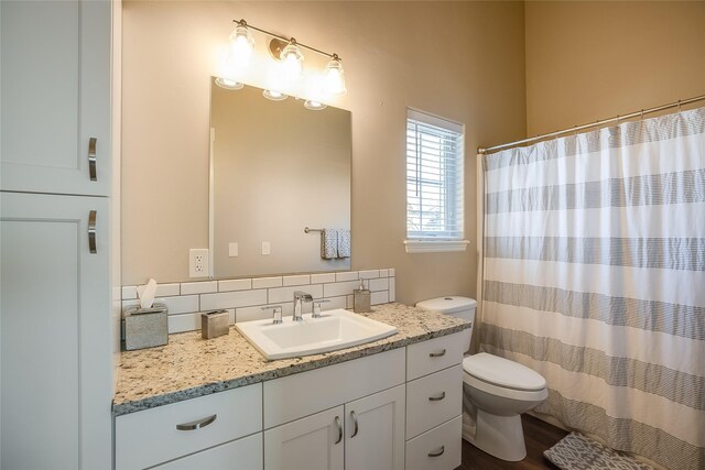 442 4th Ave E, Kalispell, MT 59901 - half bathroom with toilet and wood finished floors