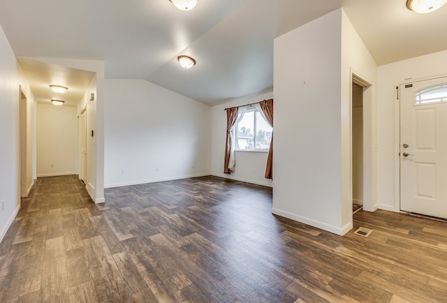 1126 Jordan Cir, Billings, MT 59105 - entryway featuring vaulted ceiling, dark wood-style flooring, and baseboards
