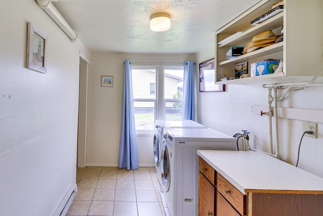 503 7th Ave W, Polson, MT 59860 - washroom with separate washer and dryer, plenty of natural light, baseboard heating, and light tile patterned floors