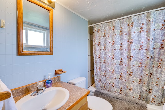503 7th Ave W, Polson, MT 59860 - full bath featuring vanity, ornamental molding, toilet, and shower / bath combination with curtain