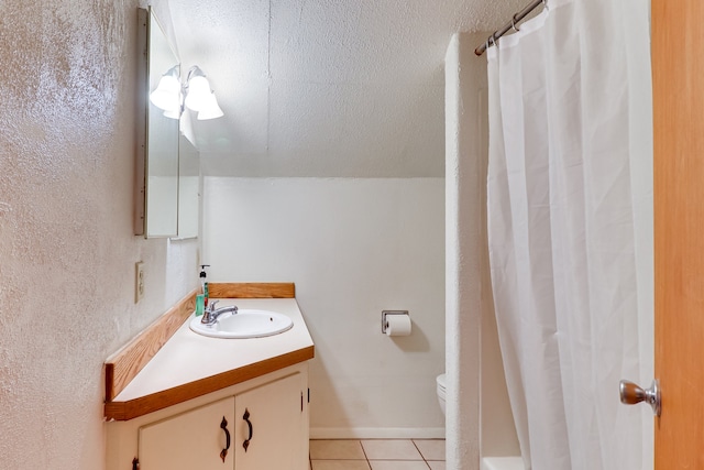 503 7th Ave W, Polson, MT 59860 - full bathroom featuring vanity, tile patterned flooring, and toilet