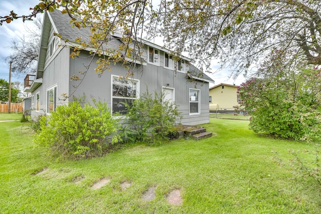 503 7th Ave W, Polson, MT 59860 - view of property exterior with a shingled roof