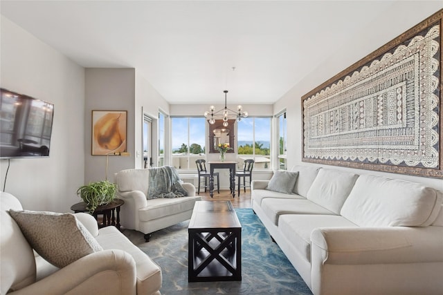 100 Woodlands Way Unit S305, Kalispell, MT 59901 - living area featuring a chandelier and wood finished floors