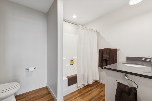 100 Woodlands Way Unit S305, Kalispell, MT 59901 - full bath featuring wood finished floors, vanity, shower / bath combination with curtain, and recessed lighting