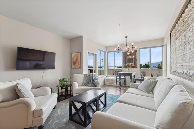 100 Woodlands Way Unit S305, Kalispell, MT 59901 - living area featuring a chandelier and dark wood-type flooring