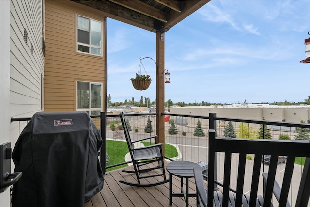 100 Woodlands Way Unit S305, Kalispell, MT 59901 - wooden deck featuring a grill