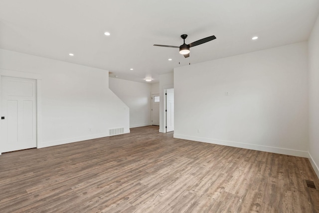602 Holstein Way, Kalispell, MT 59901 - unfurnished living room featuring wood finished floors, recessed lighting, and a ceiling fan