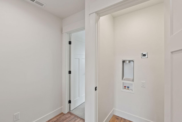 604 Holstein Way, Kalispell, MT 59901 - laundry room with hookup for an electric dryer, washer hookup, and light wood finished floors