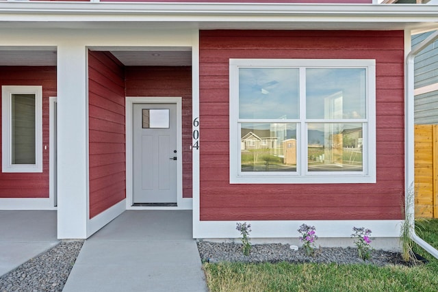 604 Holstein Way, Kalispell, MT 59901 - doorway to property featuring covered porch
