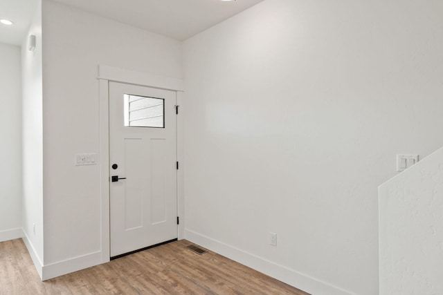 604 Holstein Way, Kalispell, MT 59901 - foyer entrance featuring light wood-style flooring and recessed lighting
