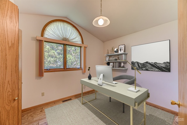 2685 Pinkerton Dr, East Helena, MT 59635 - office area featuring lofted ceiling, wood finished floors, and baseboards