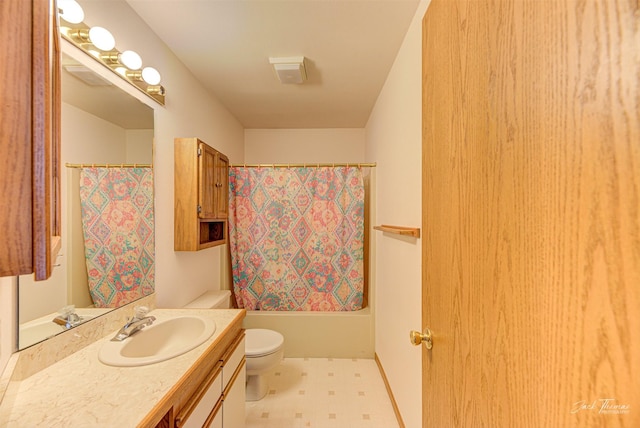 2685 Pinkerton Dr, East Helena, MT 59635 - bathroom featuring toilet, vanity, tile patterned floors, and shower / tub combo