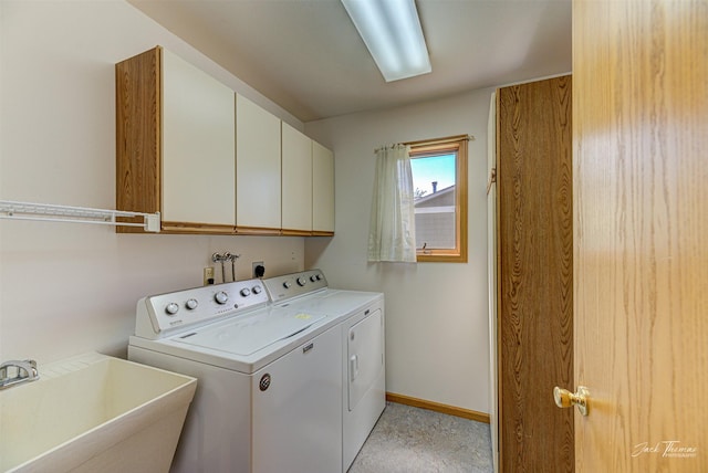 2685 Pinkerton Dr, East Helena, MT 59635 - laundry area featuring cabinet space, washing machine and dryer, and baseboards