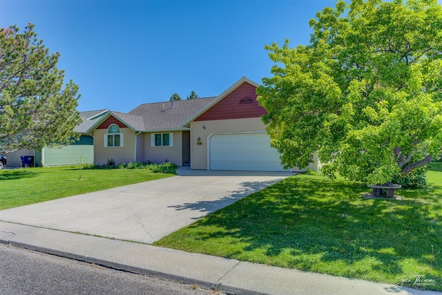 2685 Pinkerton Dr, East Helena, MT 59635 - view of front of property featuring a garage, a front lawn, and driveway