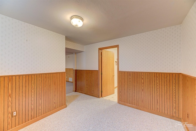 2685 Pinkerton Dr, East Helena, MT 59635 - empty room with wainscoting and carpet floors