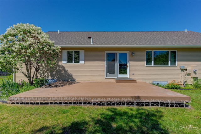 2685 Pinkerton Dr, East Helena, MT 59635 - back of house with a yard, a wooden deck, and roof with shingles