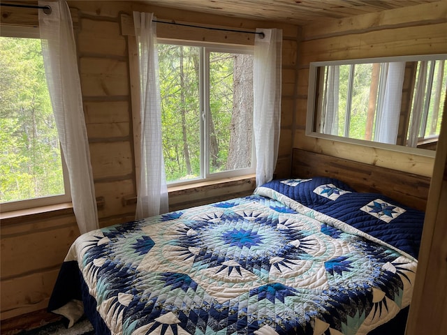 367 Lower River Rd, Heron, MT 59844 - bedroom with wooden walls and wood ceiling