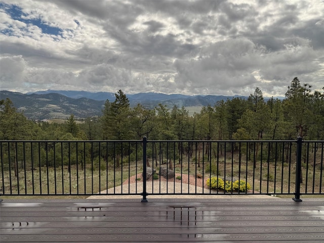 3525 Overland Rd, Helena, MT 59602 - wooden terrace featuring a mountain view and a forest view