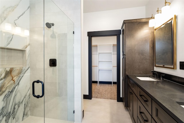 34544 Eagle Crest Dr, Polson, MT 59860 - bathroom with a stall shower, double vanity, and a walk in closet